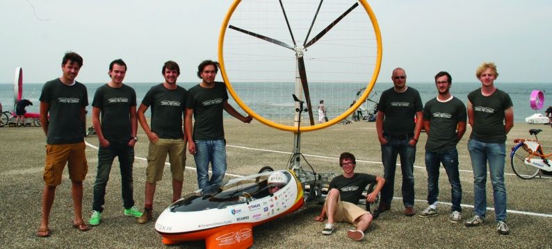 Team members of 'Stichting Rootbox' with wind powered vehicle Anemo 5